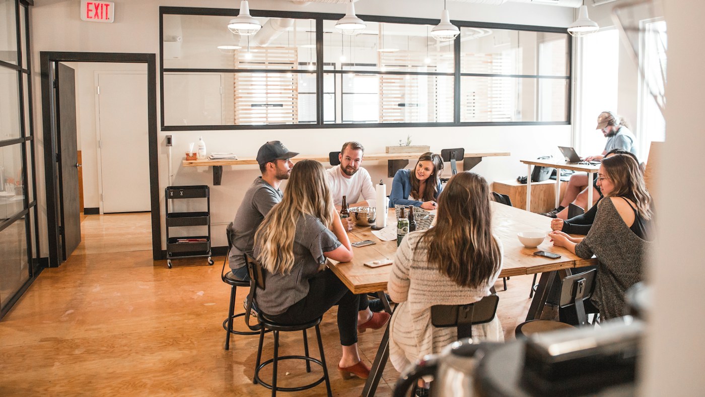 Leadership team meeting around a table